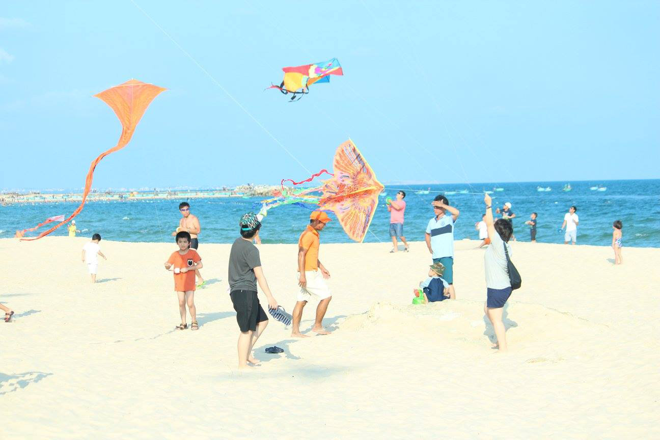 Thả diều trên cát