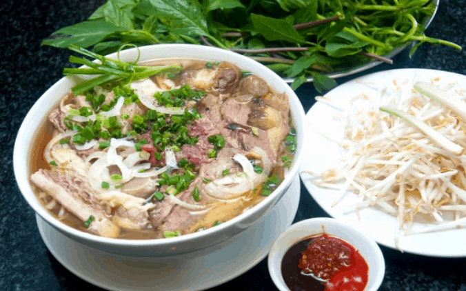 Món phở này là một món cực ngon ở quận 1 được nhiều du khách yêu thích Món phở này là một món cực ngon ở quận 1 được nhiều du khách yêu thích