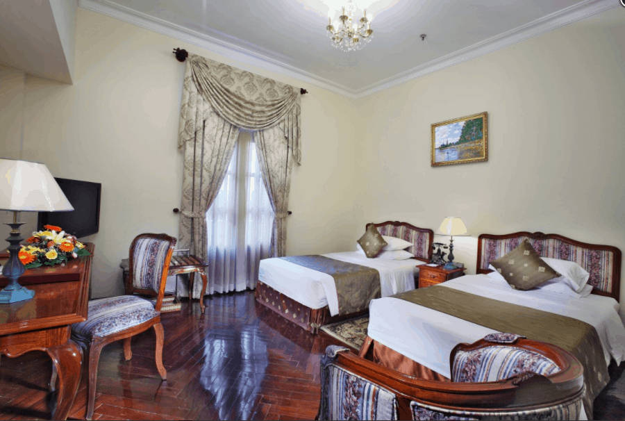 HÃ¬nh áº£nh phÃ²ng nghá» 2 giÆ°á»ng ÄÆ¡n táº¡i khÃ¡ch sáº¡n Grand
