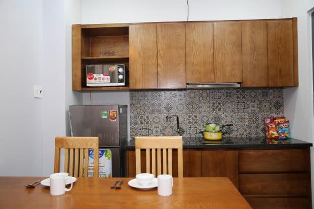 Phòng bếp khách sạn De La Casa Apartment - Khách sạn giá tốt ở Sài Gòn(Ảnh ST)